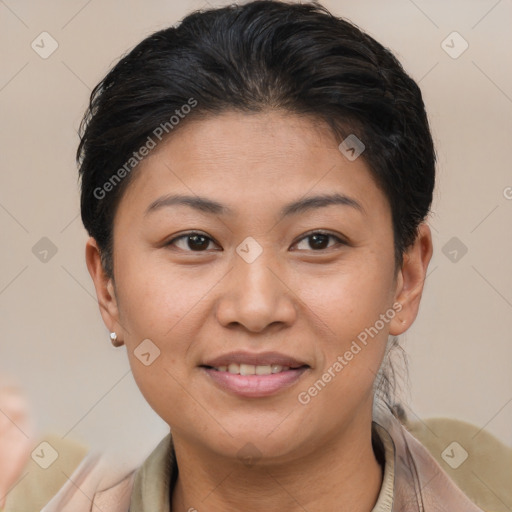 Joyful asian young-adult female with short  brown hair and brown eyes