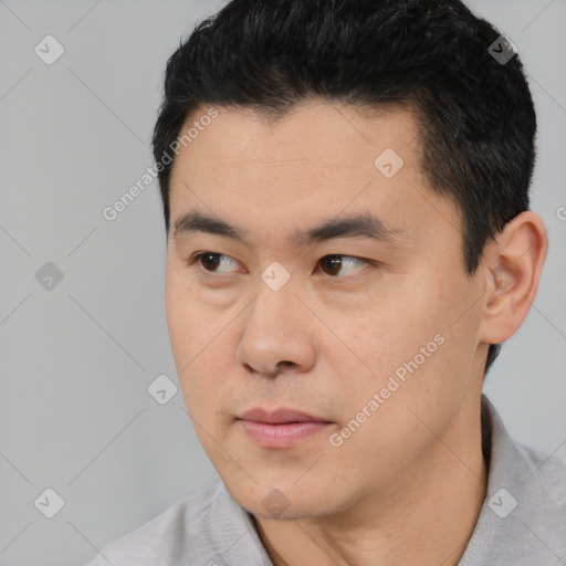 Neutral asian young-adult male with short  black hair and brown eyes