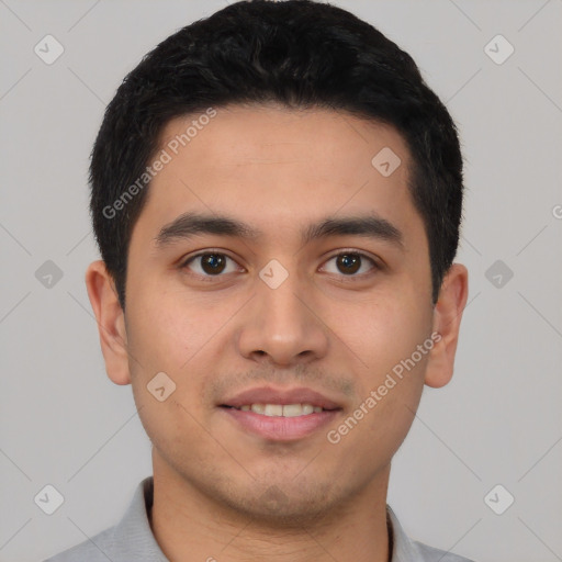 Joyful latino young-adult male with short  black hair and brown eyes