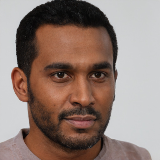 Neutral black young-adult male with short  black hair and brown eyes