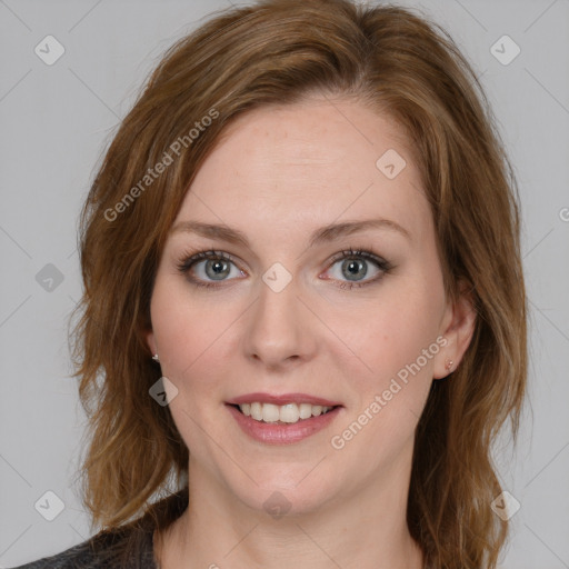 Joyful white young-adult female with medium  brown hair and green eyes