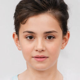 Joyful white child female with short  brown hair and brown eyes