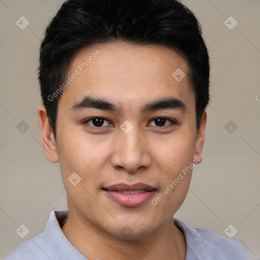 Joyful asian young-adult male with short  black hair and brown eyes