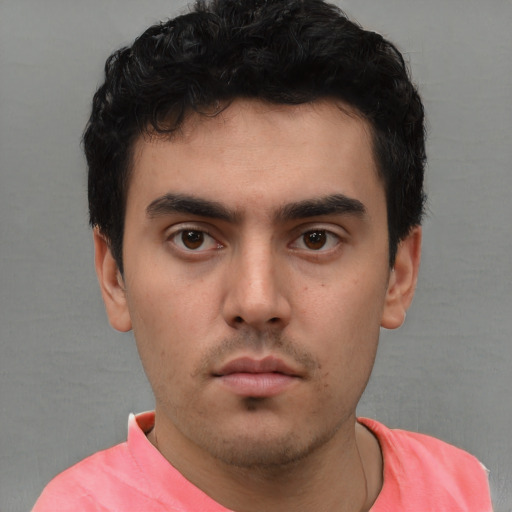 Neutral white young-adult male with short  black hair and brown eyes