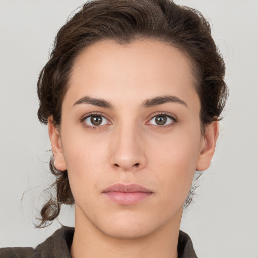 Neutral white young-adult female with medium  brown hair and brown eyes