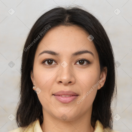 Joyful latino young-adult female with medium  brown hair and brown eyes