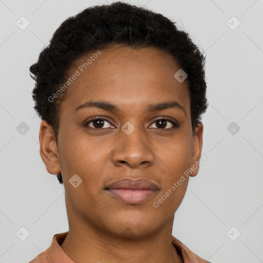 Joyful black young-adult female with short  brown hair and brown eyes