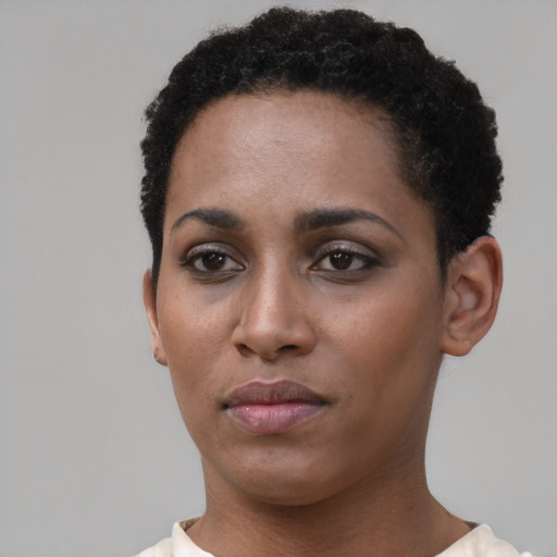 Neutral black young-adult female with short  brown hair and brown eyes