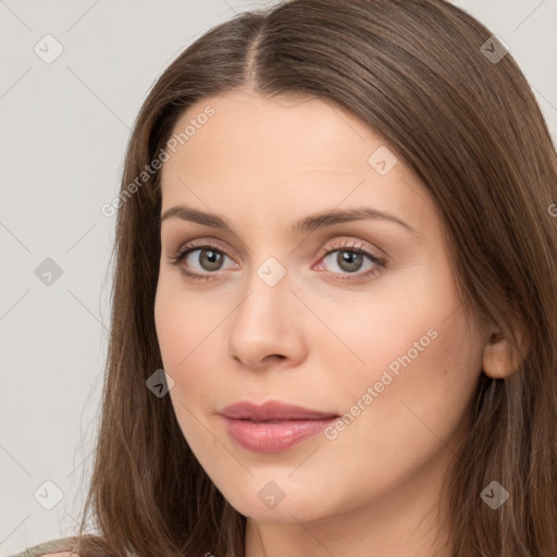 Neutral white young-adult female with long  brown hair and brown eyes