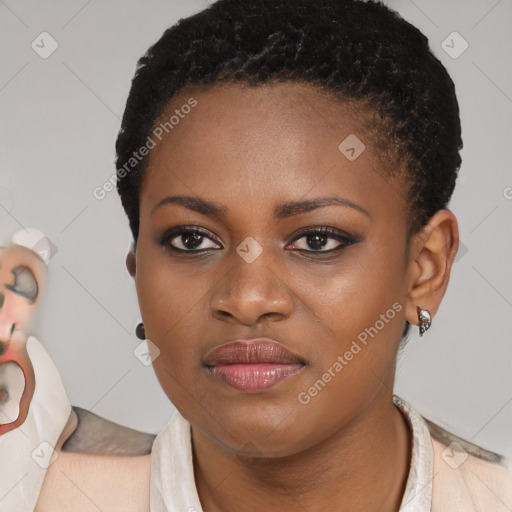 Joyful black young-adult female with short  brown hair and brown eyes