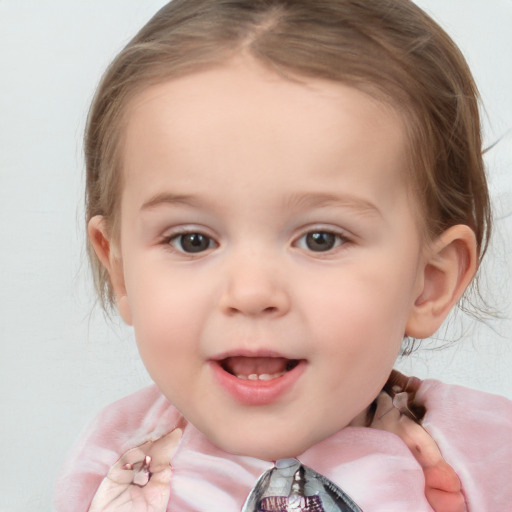 Joyful white child female with medium  brown hair and blue eyes