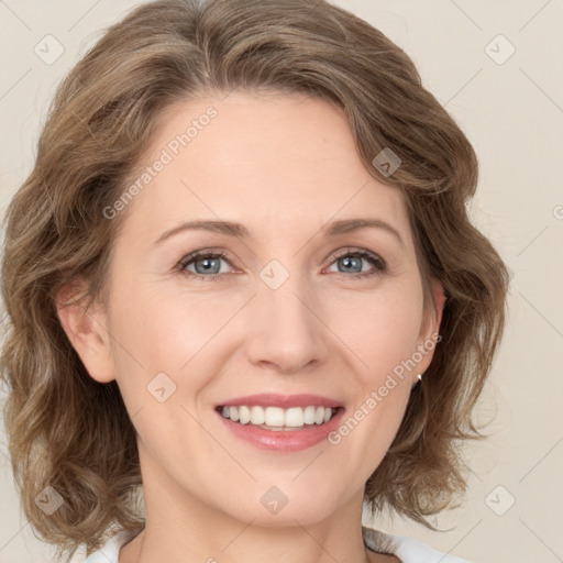 Joyful white young-adult female with medium  brown hair and green eyes