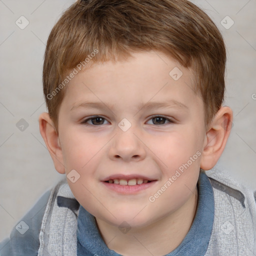 Joyful white child male with short  brown hair and brown eyes