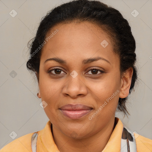 Joyful latino adult female with medium  brown hair and brown eyes