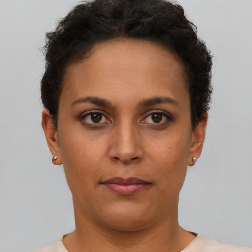 Neutral latino young-adult female with short  brown hair and brown eyes