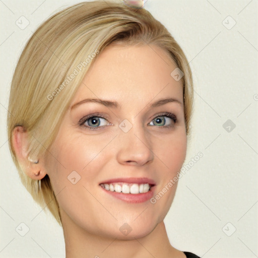 Joyful white young-adult female with medium  blond hair and blue eyes