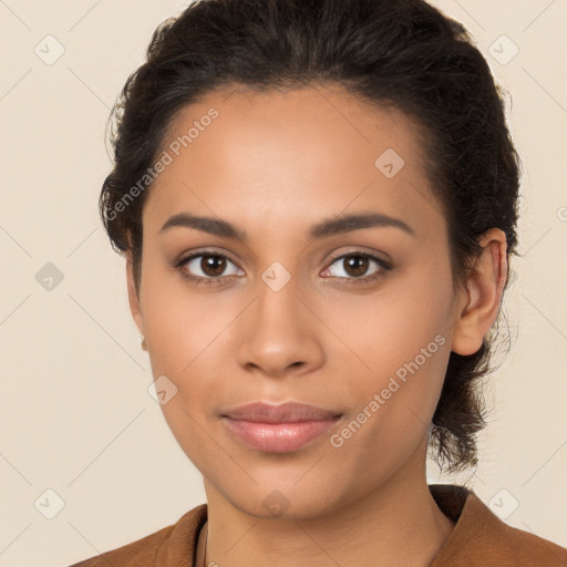 Joyful latino young-adult female with medium  brown hair and brown eyes