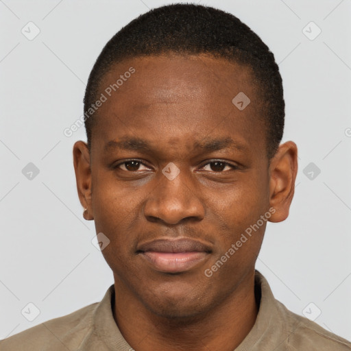 Joyful latino young-adult male with short  brown hair and brown eyes