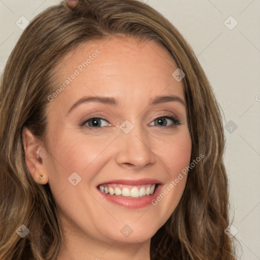 Joyful white young-adult female with long  brown hair and green eyes