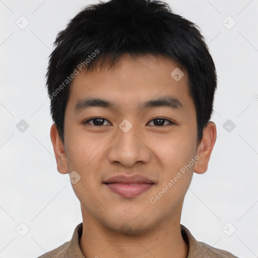 Joyful asian young-adult male with short  brown hair and brown eyes