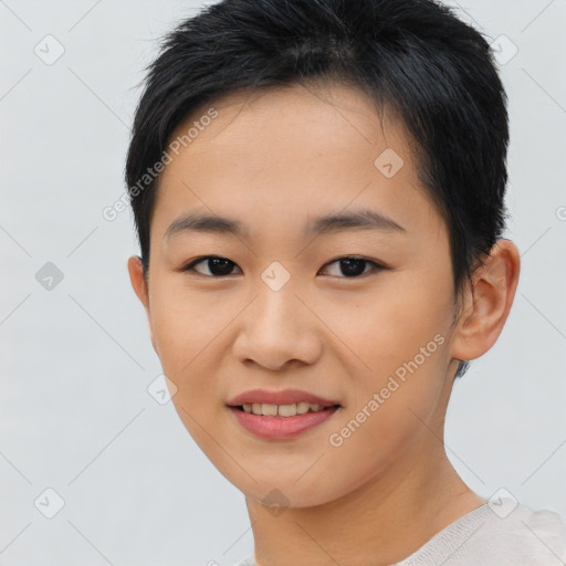 Joyful asian young-adult female with short  brown hair and brown eyes