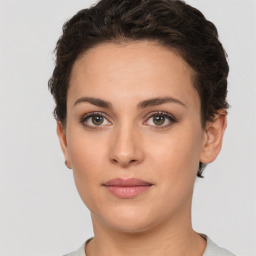 Neutral white young-adult female with short  brown hair and brown eyes