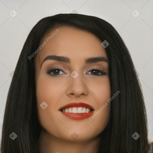 Joyful latino young-adult female with long  black hair and brown eyes