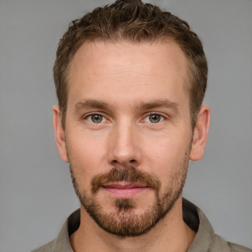 Neutral white young-adult male with short  brown hair and grey eyes