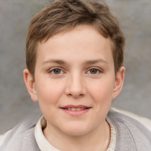 Joyful white child female with short  brown hair and grey eyes