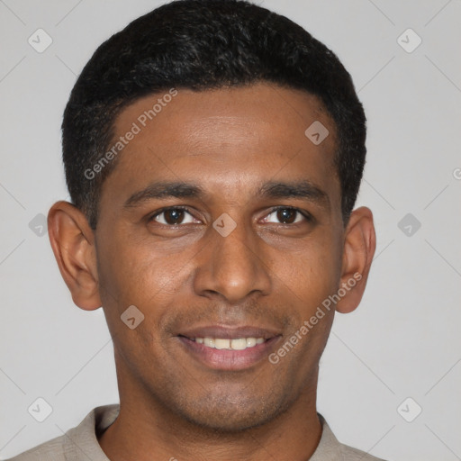 Joyful latino young-adult male with short  black hair and brown eyes