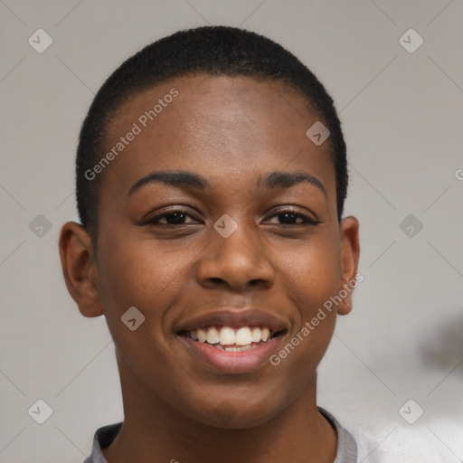 Joyful black young-adult female with short  brown hair and brown eyes