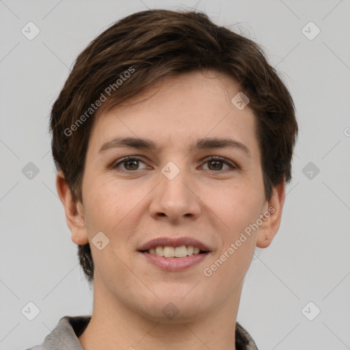 Joyful white young-adult female with short  brown hair and grey eyes