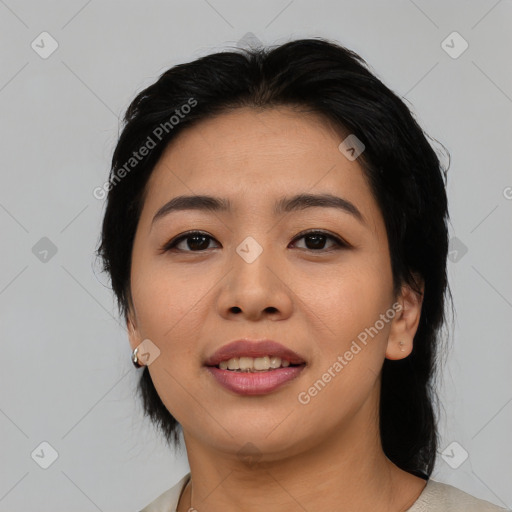 Joyful asian young-adult female with medium  black hair and brown eyes