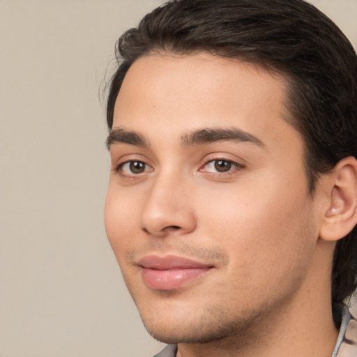 Joyful white young-adult male with medium  brown hair and brown eyes