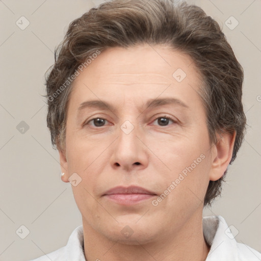 Joyful white adult female with short  brown hair and brown eyes