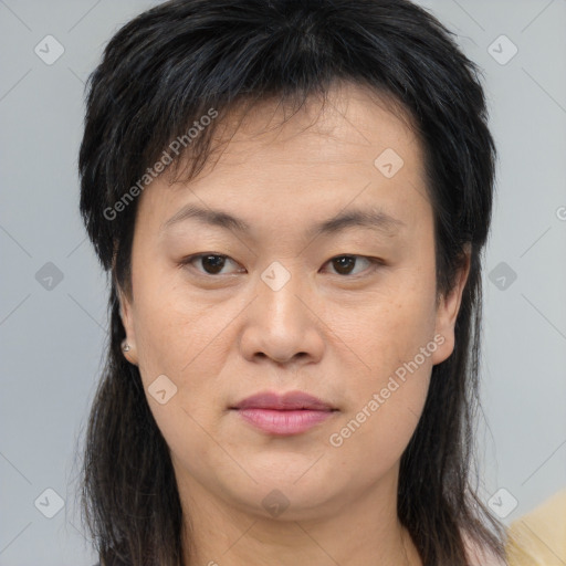 Joyful asian young-adult female with long  brown hair and brown eyes