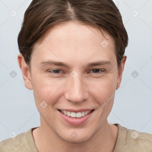 Joyful white young-adult female with short  brown hair and grey eyes