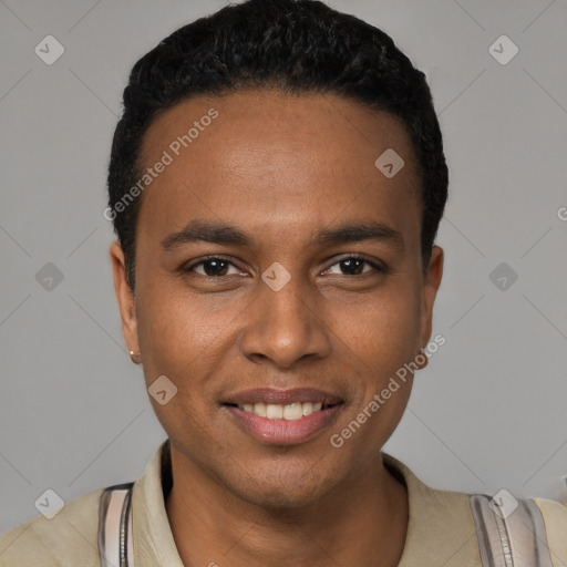 Joyful black young-adult male with short  black hair and brown eyes