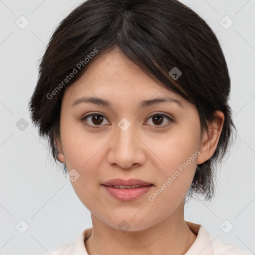 Joyful asian young-adult female with medium  brown hair and brown eyes