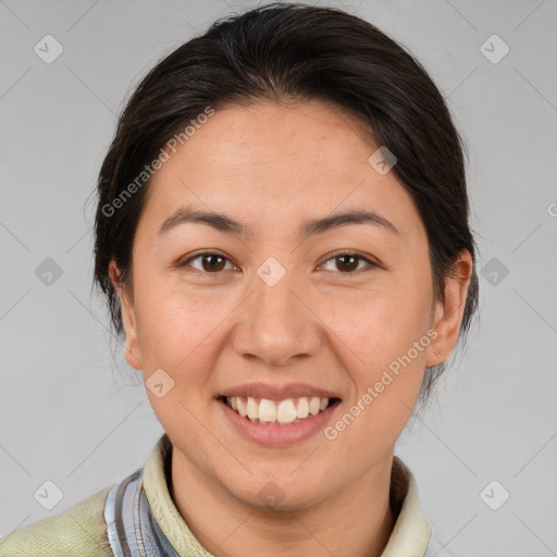 Joyful white adult female with medium  brown hair and brown eyes