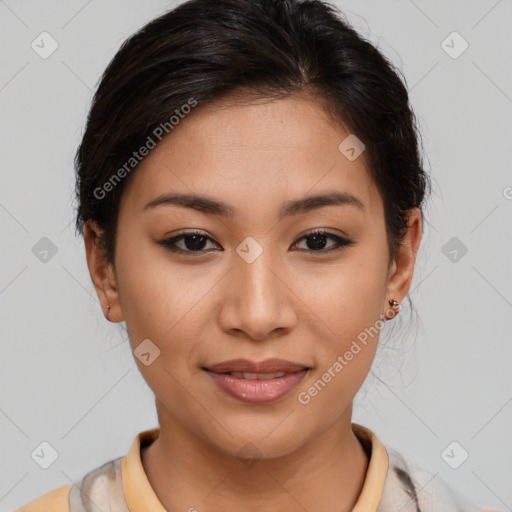 Joyful latino young-adult female with medium  brown hair and brown eyes