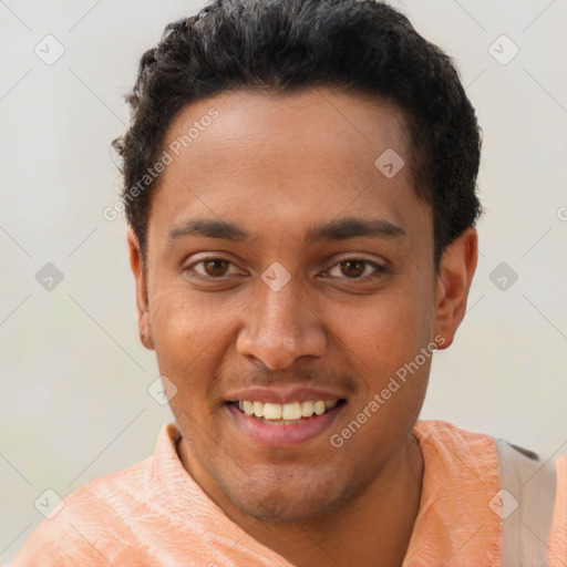 Joyful latino young-adult male with short  brown hair and brown eyes
