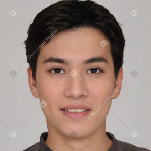 Joyful asian young-adult male with short  brown hair and brown eyes