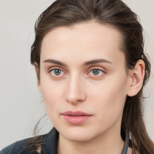 Neutral white young-adult female with medium  brown hair and grey eyes