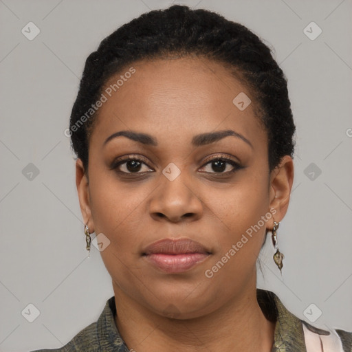 Joyful black young-adult female with short  black hair and brown eyes