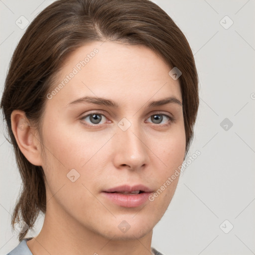 Neutral white young-adult female with medium  brown hair and grey eyes