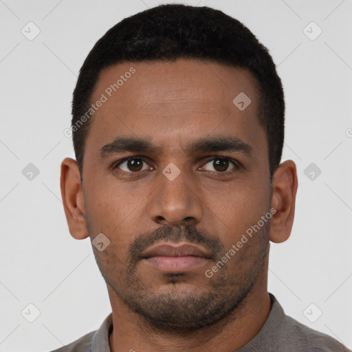 Neutral latino young-adult male with short  black hair and brown eyes