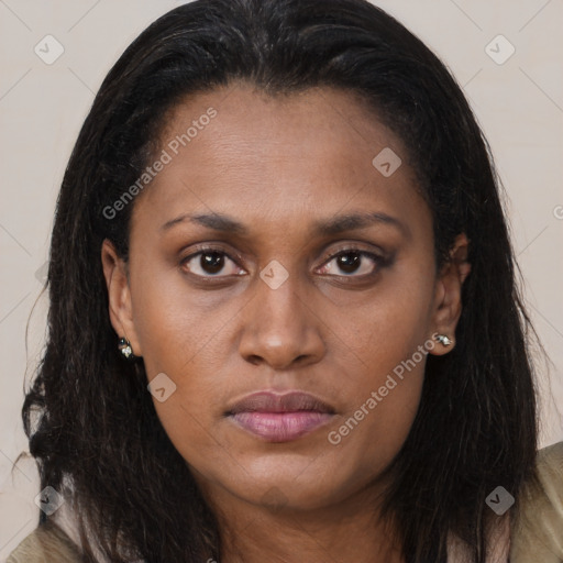 Joyful latino young-adult female with long  brown hair and brown eyes