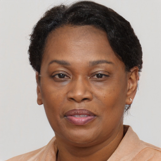 Neutral black adult female with short  brown hair and brown eyes