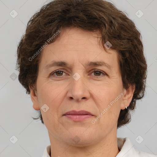 Joyful white adult female with short  brown hair and brown eyes